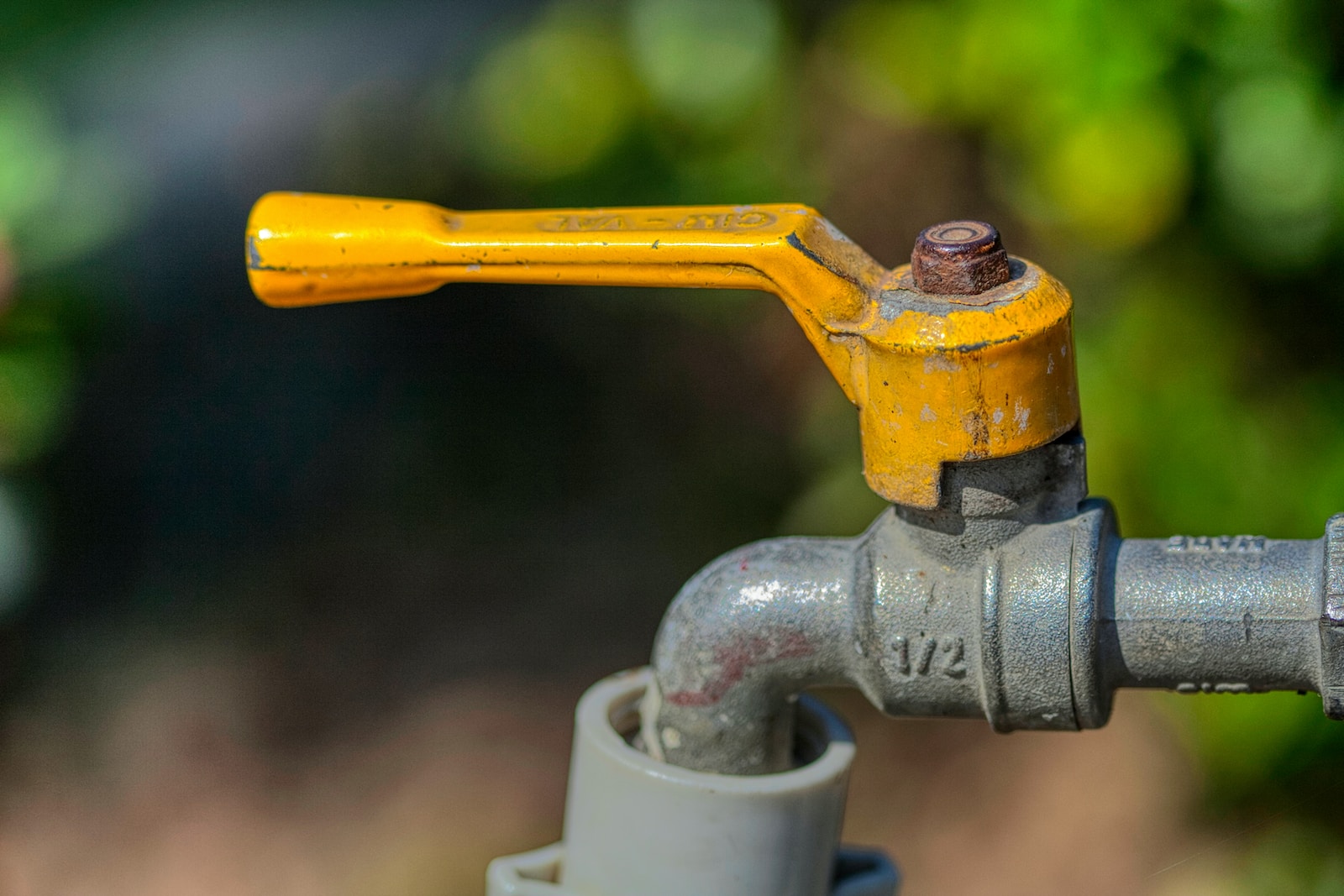 a close up of a yellow handlebar on a bike